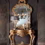 Gold-leaf-console-figured-mirror-open-work-Villa-Venezia-collection-Modenese-Gastoneážiýuzž
