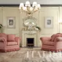 Classic-boiserie-fireplace-and-soft-armchairs-Bella-Vita-collection-Modenese-Gastone
