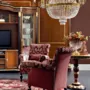 Games-room-with-bottle-showcase-and-armchair-Bella-Vita-collection-Modenese-Gastone